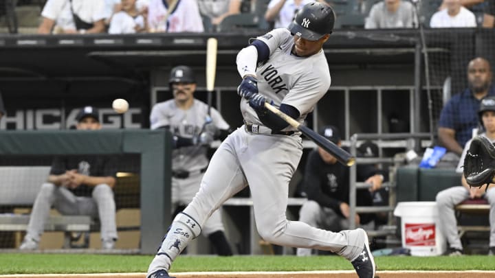 Aug 14, 2024; Chicago, Illinois, USA; New York Yankees outfielder Juan Soto (22) hits a home run against the Chicago White Sox during the first inning at Guaranteed Rate Field. Aug 14, 2024; Chicago, Illinois, USA; New York Yankees outfielder Juan Soto (22) hits a home run against the Chicago White Sox during the first inning at Guaranteed Rate Field.