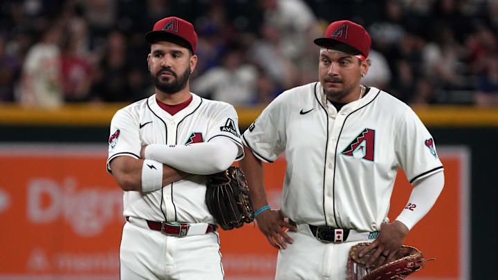 Arizona Diamondbacks third baseman Eugenio Suarez and first baseman Josh Naylor