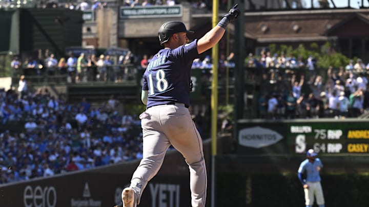 Seattle Mariners designated hitter Mitch Garver celebrates after hitting a home run against the Chicago Cubs on June 20 at Wrigley Field.