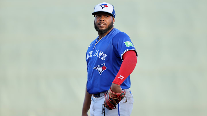 Mar 18, 2025; Sarasota, Florida, USA;  Toronto Blue Jays first base Vladimir Guerrero Jr. (27) looks on during the seocnd inning against the Baltimore Orioles at Ed Smith Stadium. 