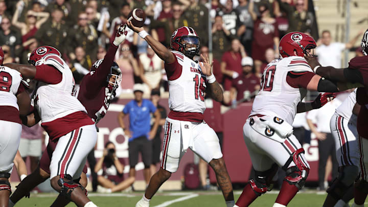 Nov 15, 2025; College Station, Texas, USA; South Carolina Gamecocks quarterback Lanorris Sellers (16) completes a fourth down pass for a first down during the fourth quarter against the Texas A&M Aggies at Kyle Field. Mandatory Credit: Troy Taormina-Imagn Images