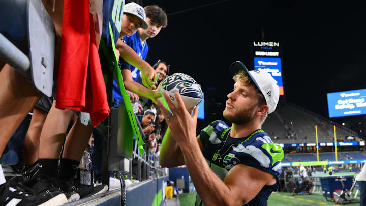 Seattle Seahawks wide receiver Cooper Kupp (10) interacts with fans after the game against the Las Vegas Raiders at Lumen Field. 