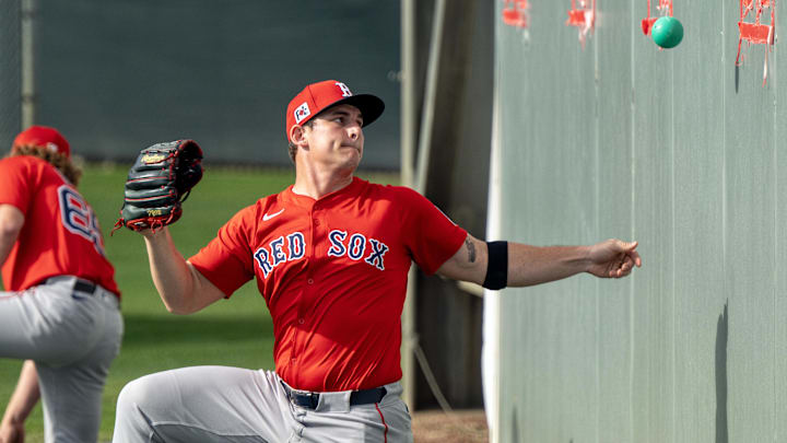 Boston Red Sox pitcher Zach Penrod (67) throws a ball against a wall during the first day of Spring Training on Feb 12, 2025 in Lee County, FL, USA. Chris Tilley-Imagn Images