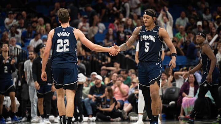 Mar 17, 2024; Orlando, Florida, USA; Orlando Magic forward Paolo Banchero (5) celebrates with Orlando Magic forward Franz Wagner (22) in the fourth quarter against the Toronto Raptors at KIA Center. Mandatory Credit: Jeremy Reper-Imagn Images Mar 17, 2024; Orlando, Florida, USA; Orlando Magic forward Paolo Banchero (5) celebrates with Orlando Magic forward Franz Wagner (22) in the fourth quarter against the Toronto Raptors at KIA Center. Mandatory Credit: Jeremy Reper-Imagn Images