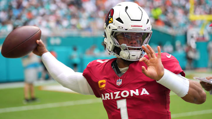 Oct 27, 2024; Miami Gardens, Florida, USA; Arizona Cardinals quarterback Kyler Murray (1) warms-up on the sideline in the first quarter against the Miami Dolphins at Hard Rock Stadium. Mandatory Credit: Jim Rassol-Imagn Images Oct 27, 2024; Miami Gardens, Florida, USA; Arizona Cardinals quarterback Kyler Murray (1) warms-up on the sideline in the first quarter against the Miami Dolphins at Hard Rock Stadium. Mandatory Credit: Jim Rassol-Imagn Images