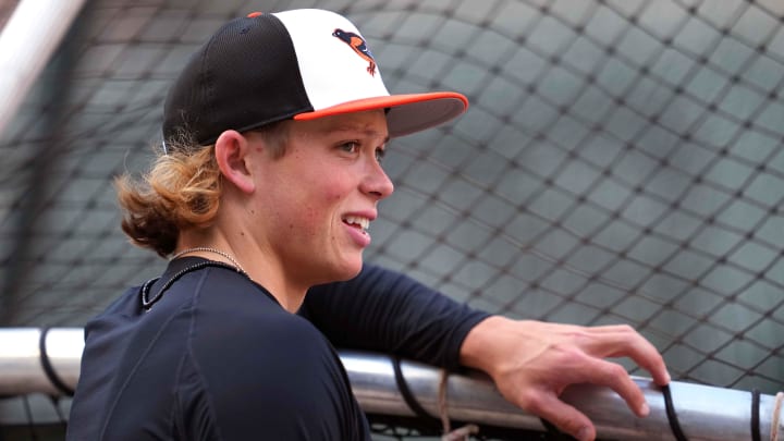 Apr 12, 2024; Baltimore, Maryland, USA; Baltimore Orioles second baseman Jackson Holliday (7) takes batting practice prior to the game against the Milwaukee Brewers at Oriole Park at Camden Yards