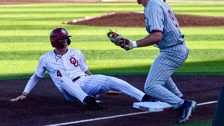 Oklahoma outfielder Alec Blair slides into third base against Gonzaga.