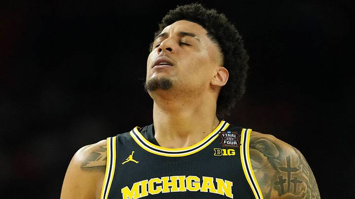 Apr 4, 2026; Indianapolis, IN, USA; Michigan Wolverines forward Yaxel Lendeborg (23) reacts after a play against the Arizona Wildcats during the first half in a semifinal of the Final Four of the men's 2026 NCAA Tournament at Lucas Oil Stadium. Mandatory Credit: Bob Donnan-Imagn Images