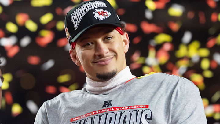 Confetti falls as Kansas City Chiefs quarterback Patrick Mahomes celebrates after defeating the Buffalo Bills during the AFC Championship game at GEHA Field at Arrowhead Stadium. Confetti falls as Kansas City Chiefs quarterback Patrick Mahomes celebrates after defeating the Buffalo Bills during the AFC Championship game at GEHA Field at Arrowhead Stadium.