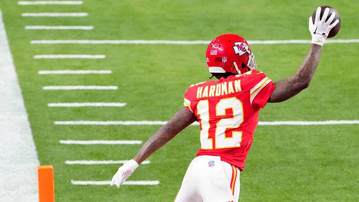 Feb 11, 2024; Paradise, Nevada, USA;  Kansas City Chiefs wide receiver Mecole Hardman Jr. (12) scores the winning touchdown against the San Francisco 49ers during overtime in Super Bowl LVIII at Allegiant Stadium. Mandatory Credit: Stephen R. Sylvanie-Imagn Images