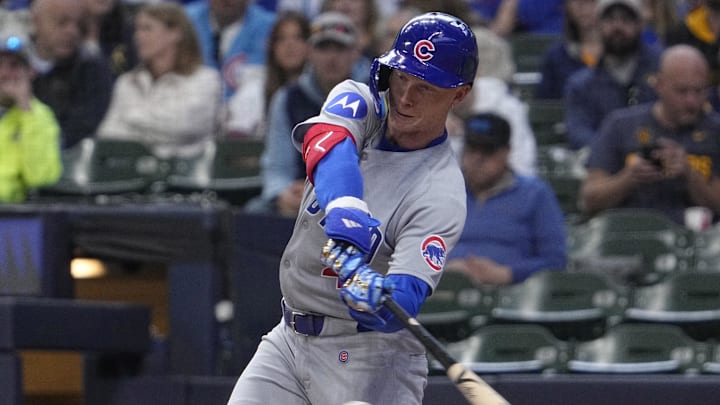 May 4, 2025; Milwaukee, Wisconsin, USA; Chicago Cubs outfielder Pete Crow-Armstrong (4) gets a hit against the Milwaukee Brewers in the fifth inning at American Family Field. 