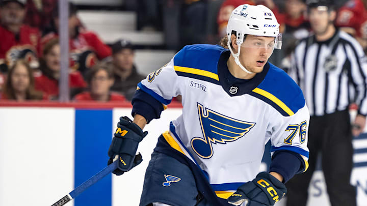 Dec 5, 2024; Calgary, Alberta, CAN; St. Louis Blues center Zachary Bolduc (76) skates against the Calgary Flames during the first period at Scotiabank Saddledome. Mandatory Credit: Brett Holmes-Imagn Images