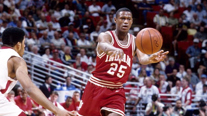 Indiana Hoosiers guard A.J. Guyton (25) in action against St. John's Red Storm guard Collin Charles during the second round of the NCAA tournament at the Orlando Arena. St. John's defeated Indiana 86-61.