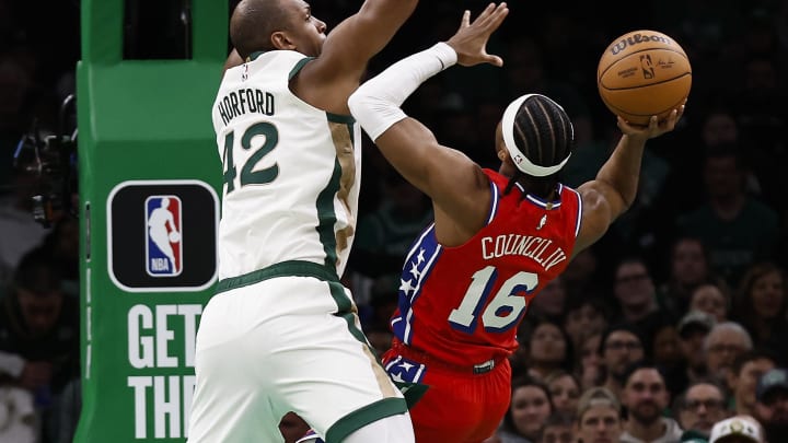Feb 27, 2024; Boston, Massachusetts, USA; Boston Celtics center Al Horford (42) tries to block a shot by Philadelphia 76ers guard Ricky Council IV (16) during the second half at TD Garden. Mandatory Credit: Winslow Townson-USA TODAY Sports