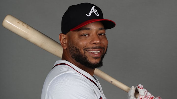 Two veteran bats are being promoted to the Braves' 40-man roster Two veteran bats are being promoted to the Braves' 40-man roster