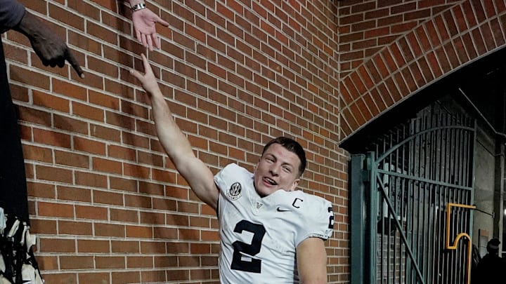 Vanderbilt quarterback Diego Pavia (2) celebrates with fans after the team’s win against Tennessee at Neyland Stadium in Knoxville, Tenn., Saturday, Nov. 29, 2025. Vanderbilt quarterback Diego Pavia (2) celebrates with fans after the team’s win against Tennessee at Neyland Stadium in Knoxville, Tenn., Saturday, Nov. 29, 2025.