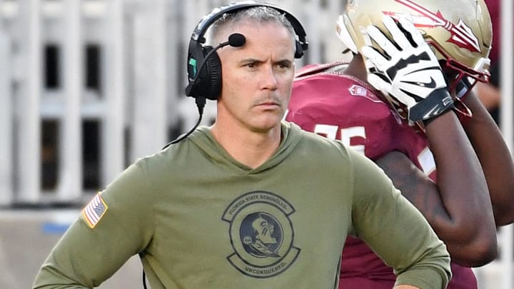 Nov 2, 2024; Tallahassee, Florida, USA; Florida State Seminoles head coach Mike Norvell looks on from the sideline after the North Carolina Tarheels score a final touchdown in the fourth quarter at Doak S. Campbell Stadium. Mandatory Credit: Robert Myers-Imagn Images