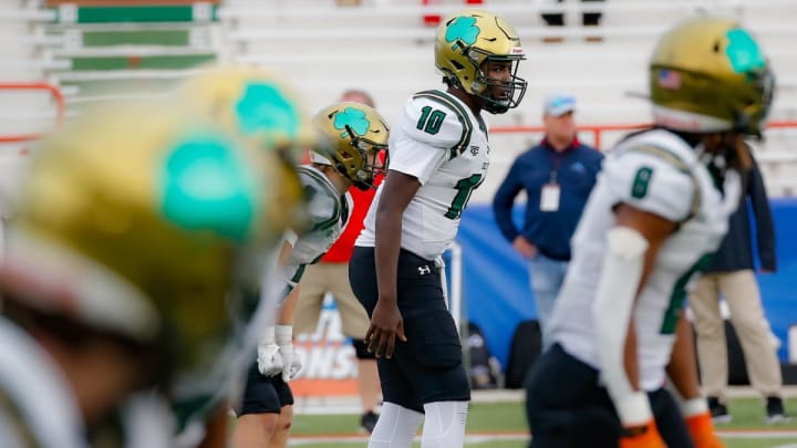 Preston Wright quarterbacking in the 2023 Class 1S state championship game against Cardinal Gobbins 