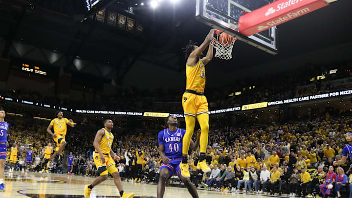 Dec 8, 2024; Columbia, Missouri, USA; Missouri Tigers guard Aidan Shaw slams down a dunk during a game against the Kansas Jayhawks at Mizzou Arena Dec 8, 2024; Columbia, Missouri, USA; Missouri Tigers guard Aidan Shaw slams down a dunk during a game against the Kansas Jayhawks at Mizzou Arena