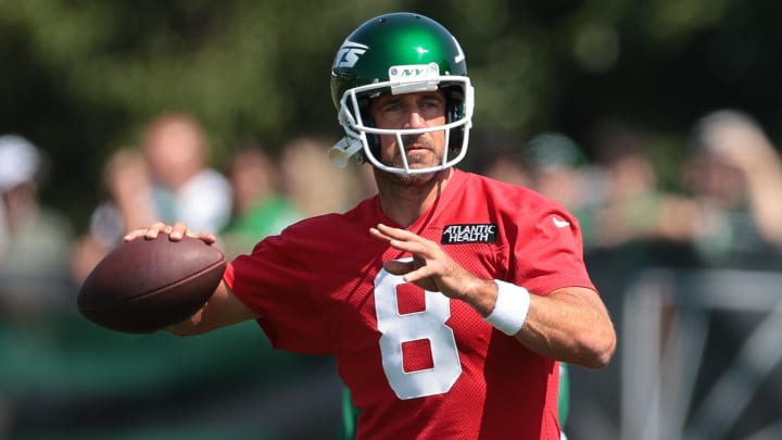 Jul 27, 2024; Florham Park, NJ, USA; New York Jets quarterback Aaron Rodgers (8) throws the ball during training camp at Atlantic Health Jets Training Center. Jul 27, 2024; Florham Park, NJ, USA; New York Jets quarterback Aaron Rodgers (8) throws the ball during training camp at Atlantic Health Jets Training Center.