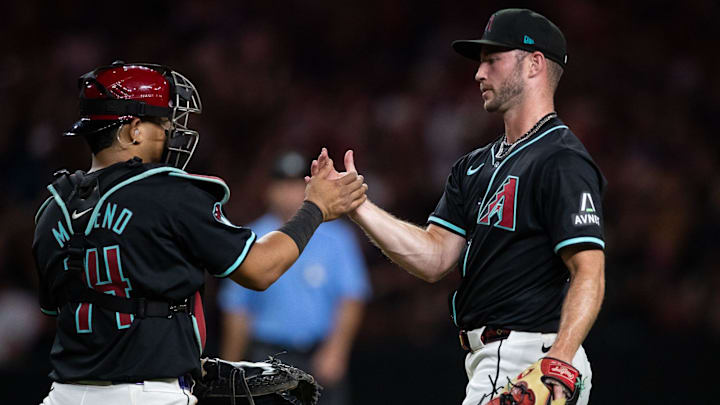 Arizona Diamondbacks catcher Gabriel Moreno (14) shakes hands with Arizona Diamondbacks pitcher Bryce Jarvis (40) after defeating the Pittsburgh Pirates on July 27, 2024 at Chase Field in Phoenix. Arizona Diamondbacks catcher Gabriel Moreno (14) shakes hands with Arizona Diamondbacks pitcher Bryce Jarvis (40) after defeating the Pittsburgh Pirates on July 27, 2024 at Chase Field in Phoenix.