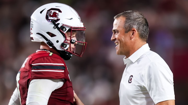 South Carolina football coach Shane Beamer with quarterback Spencer Rattler