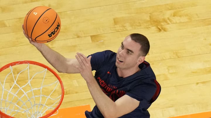 Apr 3, 2026; Indianapolis, IN, USA; Illinois Fighting Illini forward Toni Bilic (9) shoots the ball during a practice session ahead of the Final Four of the men's 2026 NCAA Tournament at Lucas Oil Stadium. Mandatory Credit: Robert Deutsch-Imagn Images