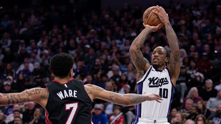 Jan 6, 2025; Sacramento, California, USA; Sacramento Kings forward DeMar DeRozan (10) takes a jump shot during the third quarter against the Miami Heat at Golden 1 Center. Mandatory Credit: Ed Szczepanski-Imagn Images