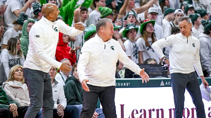 From left, s Michigan State's assistant coach Saddi Washington, head coach Tom Izzo and associate head coach Doug Wojcik react to a call during the second half against Duke on Saturday, Dec. 6, 2025, at the Breslin Center in East Lansing.