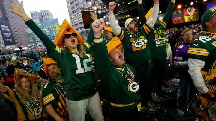 Green Bay Packers fans yell as their pick is made in the second round of the 2024 NFL draft in Detroit on Friday, April 26, 2024.