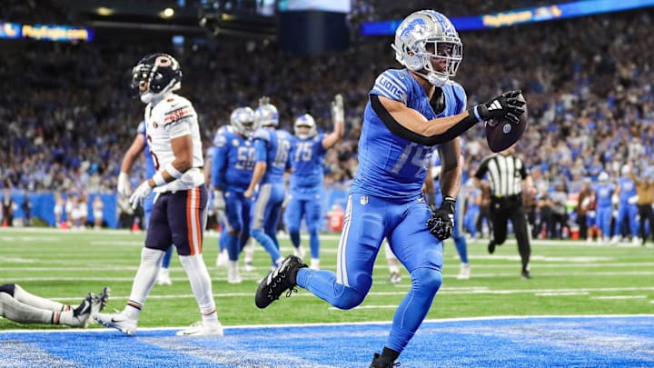 Detroit Lions receiver Amon-Ra St. Brown celebrates a touchdown.