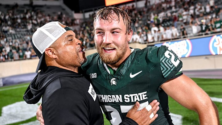 Michigan State's Cal Haladay, right, celebrates with defensive backs coach Demetrice Martin after the Spartans win over Florida Atlantic on Friday, Aug. 30, 2024, at Spartan Stadium in East Lansing. Michigan State's Cal Haladay, right, celebrates with defensive backs coach Demetrice Martin after the Spartans win over Florida Atlantic on Friday, Aug. 30, 2024, at Spartan Stadium in East Lansing.