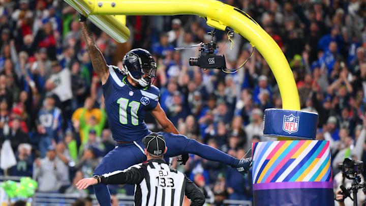 Oct 20, 2025; Seattle, Washington, USA; Seattle Seahawks wide receiver Jaxon Smith-Njigba (11) celebrates on the goal post after a touchdown during the first quarter against the Houston Texans at Lumen Field. Oct 20, 2025; Seattle, Washington, USA; Seattle Seahawks wide receiver Jaxon Smith-Njigba (11) celebrates on the goal post after a touchdown during the first quarter against the Houston Texans at Lumen Field.