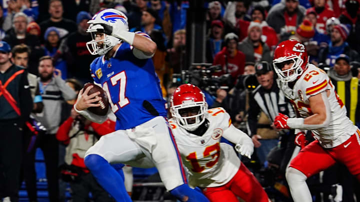 Bills quarterback Josh Allen avoids Kansas City's Nazeeh Johnson and Drue Tranquill on his late fourth quarter touchdown carry into the end zone in Orchard Park, Nov.17, 2024.