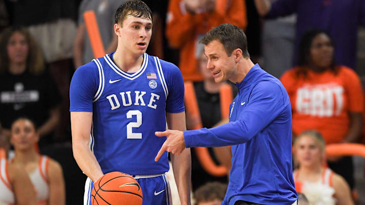 Duke freshman Cooper Flagg and coach Jon Scheyer