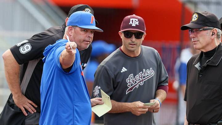 Florida head coach Kevin O'Sullivan talks with Texas A&M head coach Michael Earley before an NCAA baseball game. Florida head coach Kevin O'Sullivan talks with Texas A&M head coach Michael Earley before an NCAA baseball game.