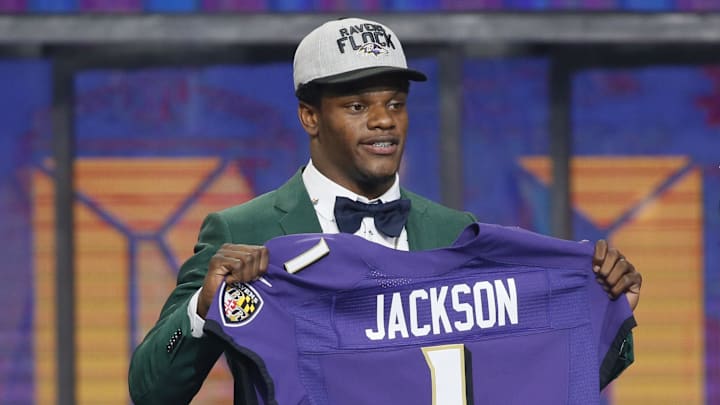 Apr 26, 2018; Arlington, TX, USA; Lamar Jackson (Louisville) is selected as the number thirty-two overall pick to the Baltimore Ravens in the first round of the 2018 NFL Draft at AT&T Stadium. Mandatory Credit: Tim Heitman-Imagn Images Apr 26, 2018; Arlington, TX, USA; Lamar Jackson (Louisville) is selected as the number thirty-two overall pick to the Baltimore Ravens in the first round of the 2018 NFL Draft at AT&T Stadium. Mandatory Credit: Tim Heitman-Imagn Images