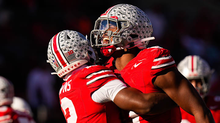 Ohio State Buckeyes defensive back Caleb Downs celebrates with linebacker Sonny Styles after sacking Rutgers Scarlet Knights quarterback Athan Kaliakmanis Ohio State Buckeyes defensive back Caleb Downs celebrates with linebacker Sonny Styles after sacking Rutgers Scarlet Knights quarterback Athan Kaliakmanis