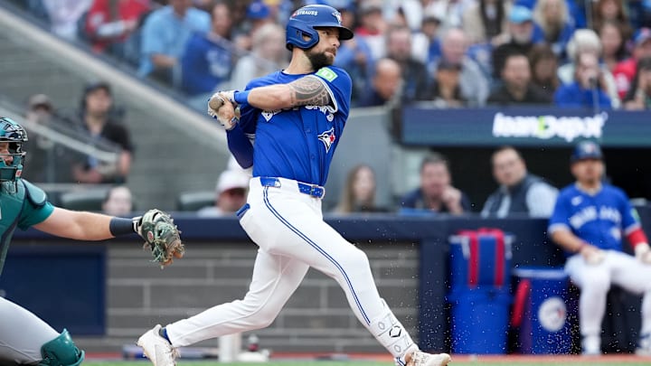 Oct 13, 2025; Toronto, Ontario, CAN; Toronto Blue Jays outfielder Nathan Lukes (38) swings at the ball during the first inning against the Seattle Mariners during game two of the ALCS round for the 2025 MLB playoffs at Rogers Centre. 