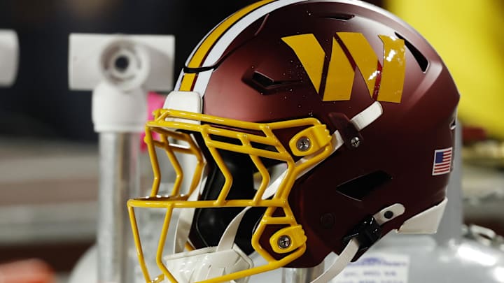 Nov 2, 2025; Landover, Maryland, USA; A Washington Commanders player's helmet on the bench during the game against the Seattle Seahawks at Northwest Stadium. Mandatory Credit: Geoff Burke-Imagn Images