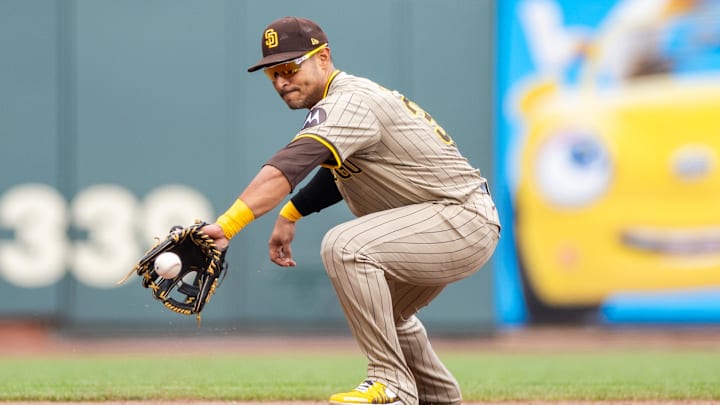 Sep 15, 2024; San Francisco, California, USA; San Diego Padres third baseman Donovan Solano (39) fields the ball during the fifth inning against the San Francisco Giants at Oracle Park. Mandatory Credit: Bob Kupbens-Imagn Images Sep 15, 2024; San Francisco, California, USA; San Diego Padres third baseman Donovan Solano (39) fields the ball during the fifth inning against the San Francisco Giants at Oracle Park. Mandatory Credit: Bob Kupbens-Imagn Images