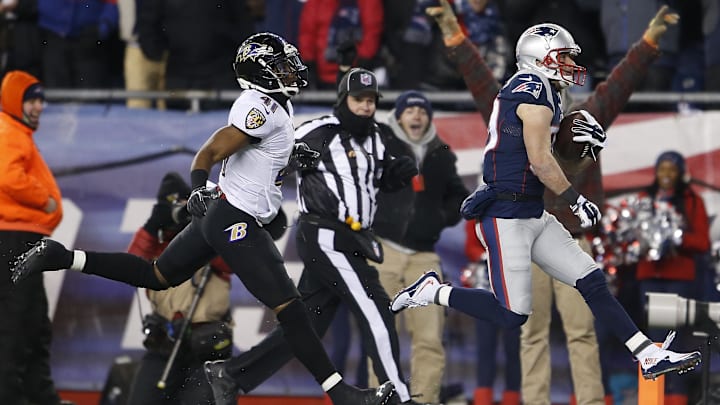 Jan 10, 2015; Foxborough, MA, USA; New England Patriots wide receiver Danny Amendola (80) carries the ball to score a touchdown in front of Baltimore Ravens cornerback Anthony Levine (41) during the third quarter in the 2014 AFC Divisional playoff football game at Gillette Stadium. Mandatory Credit: David Butler II-Imagn Images Jan 10, 2015; Foxborough, MA, USA; New England Patriots wide receiver Danny Amendola (80) carries the ball to score a touchdown in front of Baltimore Ravens cornerback Anthony Levine (41) during the third quarter in the 2014 AFC Divisional playoff football game at Gillette Stadium. Mandatory Credit: David Butler II-Imagn Images