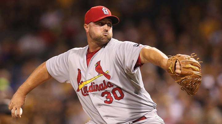 Sep 28, 2015; Pittsburgh, PA, USA; St. Louis Cardinals relief pitcher Jonathan Broxton (30) pitches against the Pittsburgh Pirates during the eighth inning at PNC Park. The Cardinals won 3-0. Mandatory Credit: Charles LeClaire-USA TODAY Sports Sep 28, 2015; Pittsburgh, PA, USA; St. Louis Cardinals relief pitcher Jonathan Broxton (30) pitches against the Pittsburgh Pirates during the eighth inning at PNC Park. The Cardinals won 3-0. Mandatory Credit: Charles LeClaire-USA TODAY Sports