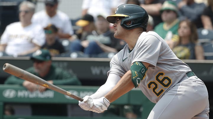 Jun 7, 2023; Pittsburgh, Pennsylvania, USA; Oakland Athletics third baseman Jonah Bride (26) hits an RBI single against the Pittsburgh Pirates during the first inning at PNC Park. Mandatory Credit: Charles LeClaire-Imagn Images Jun 7, 2023; Pittsburgh, Pennsylvania, USA; Oakland Athletics third baseman Jonah Bride (26) hits an RBI single against the Pittsburgh Pirates during the first inning at PNC Park. Mandatory Credit: Charles LeClaire-Imagn Images