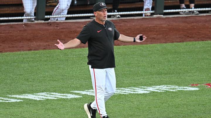 Jun 17, 2026; Omaha, NE, USA;  Georgia Bulldogs head coach Wes Johnson reacts to a call during the game against the Oklahoma Sooners during the fourth inning at Charles Schwab Field. Mandatory Credit: Steven Branscombe-Imagn Images