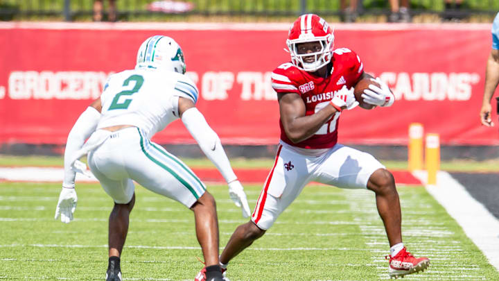 Zylan Perry 21 runs the ball as the Louisiana Ragin Cajuns take on Tulane atbCajun Field. Saturday, Sept. 21, 2024. Zylan Perry 21 runs the ball as the Louisiana Ragin Cajuns take on Tulane atbCajun Field. Saturday, Sept. 21, 2024.