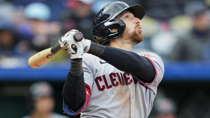 Mar 30, 2025; Kansas City, Missouri, USA; Cleveland Guardians second baseman Daniel Schneemann (10) hits a home run during the eighth inning against the Kansas City Royals at Kauffman Stadium. Mandatory Credit: Jay Biggerstaff-Imagn Images
