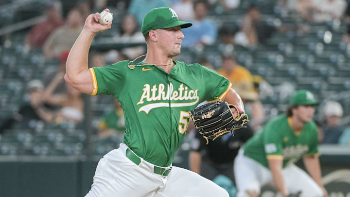 Jul 11, 2025; West Sacramento, California, USA; Athletics pitcher Jack Perkins (50) throws a pitch against the Toronto Blue Jays during the fifth inning at Sutter Health Park. Mandatory Credit: Ed Szczepanski-Imagn Images