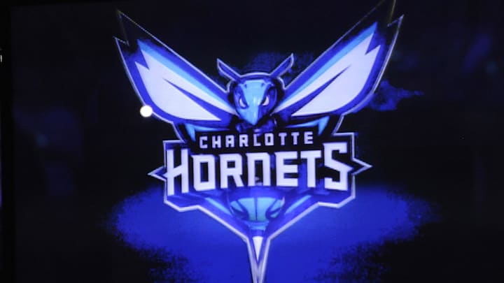 Dec 21, 2013; Charlotte, NC, USA; The Charlotte Bobcats unveil their new branding logo as the Charlotte Hornets for the 2014 season at halftime during the game against the Utah Jazz at Time Warner Cable Arena. Mandatory Credit: Sam Sharpe-Imagn Images