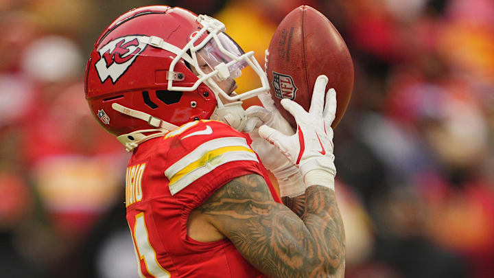 Jan 18, 2025; Kansas City, Missouri, USA; Kansas City Chiefs wide receiver Nikko Remigio (81) returns a kickoff against the Houston Texans during the second quarter of a 2025 AFC divisional round game at GEHA Field at Arrowhead Stadium. Mandatory Credit: Jay Biggerstaff-Imagn Images